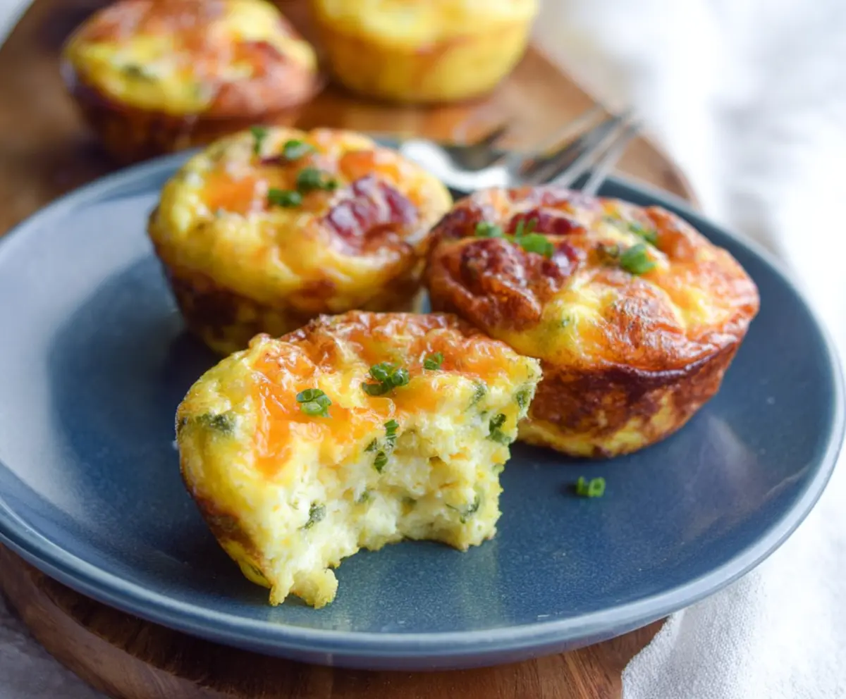 Delicious Copycat Starbucks Egg Bites served on a white plate with fresh herbs