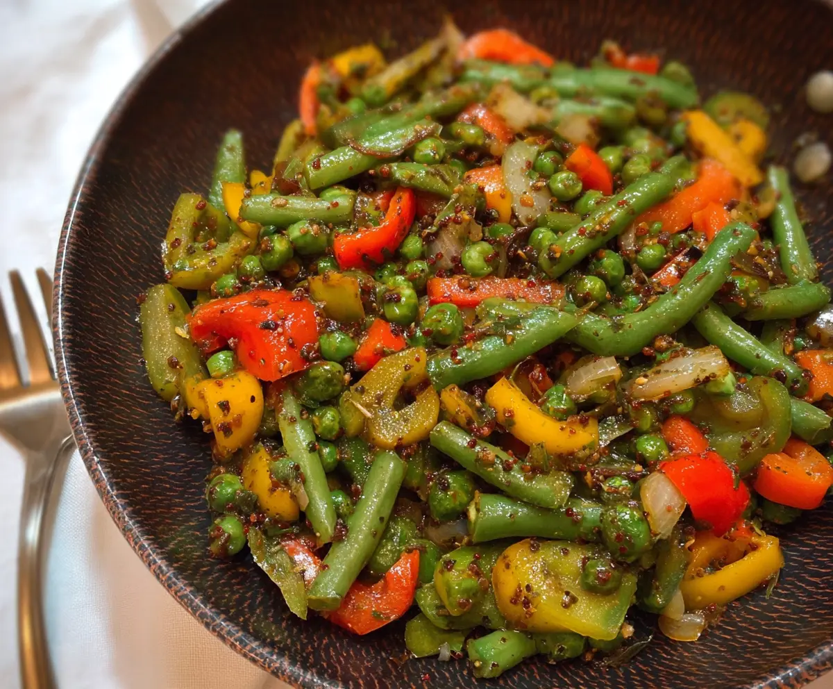 Colorful peas and peppers stir fry in a wok, fresh and vibrant vegetable dish
